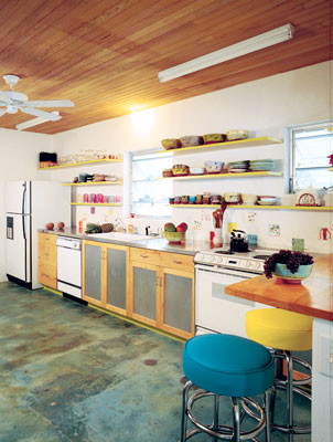 
Clean, simple lines and whole materials create a cool, fresh kitchen in the original Red Cross House. The stained concrete floor helps keep the home cool.
